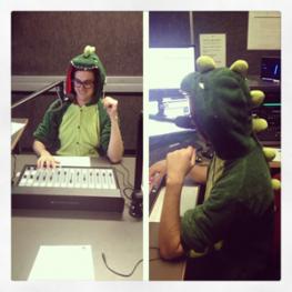 Photo of person in a dinosaur onesie with a mixer